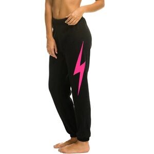 aviator nation black sweatpants with hot pink bolt